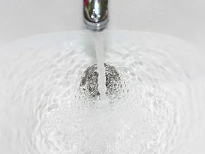 A sink with running water