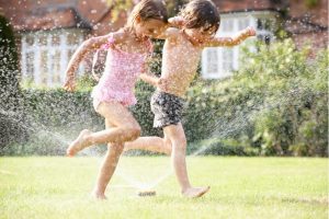 kids are playing in the water